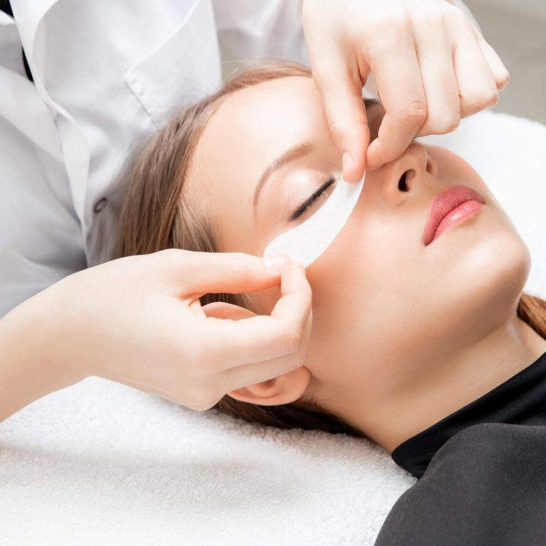 Spa anti-aging treatment, skin care patches in beauty salon.